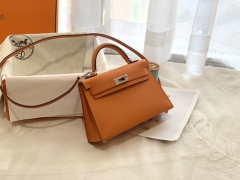 爱马仕HERMES必须拥有的小包包 mini kelly 二代 19cm 银扣 ?93橙色 靓丽经典色